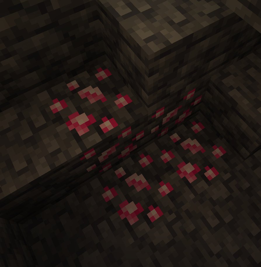 Deepslate ruby ore in a cave wall
