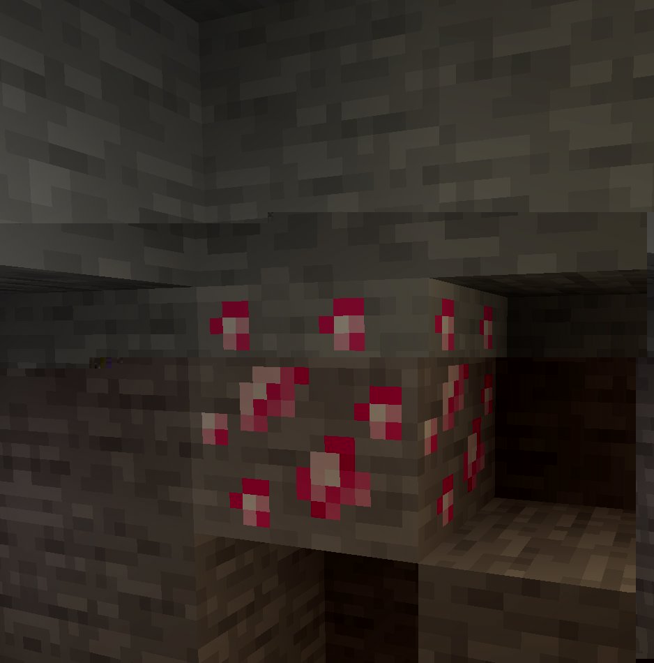 Ruby ore in a cave wall